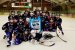 The FYHA Atom Furies celebrating after their win with their championship banner